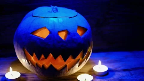 Jack O' Lantern Glowing In Fantasy Night. Halloween. On old wooden background. d Stock Footage 139488239
