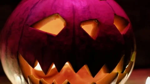 Jack O' Lantern Glowing In Fantasy Night. Halloween. On old wooden background 動画素材 139488396