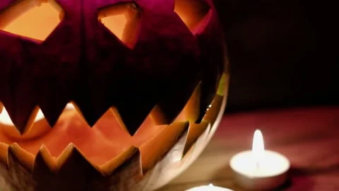 Jack O' Lantern Glowing In Fantasy Night. Halloween. On old wooden background. d Video stock 139488765