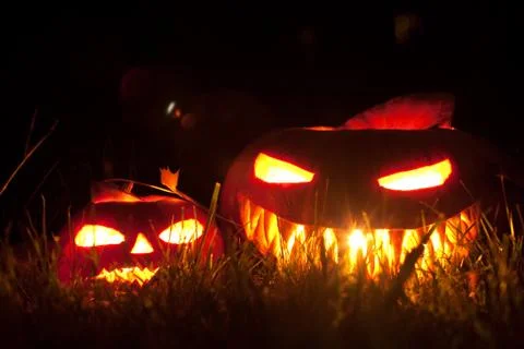 Jack o' lantern on grass Stock Photos