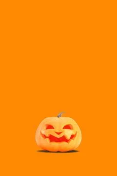 Jack o lantern isolated on orange vertical background for halloween concept. Stock Illustration