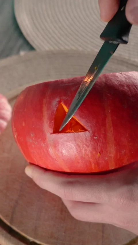 Jack-o-lantern pumpkin on Halloween holiday glows, with candles Stock Footage 286417266