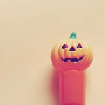 Jack o lantern pumpkin on paper with retro filter effect Foto stock