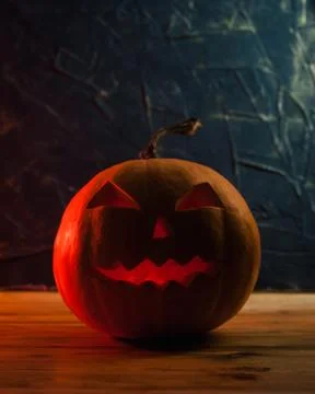 Jack o lantern, pumpkin with red eyes, vertical photo, Foto stock