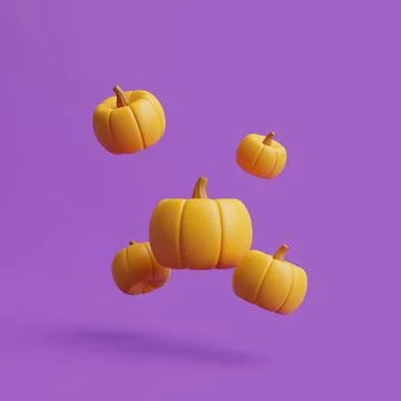 Jack-o-Lantern pumpkins floating on purple background. Happy Halloween Stock Illustration