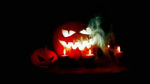Jack-o-lantern with scary pumpkin. Halloween. Light from Jack eyes. Stock Footage 141857223