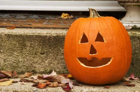 Jack o lantern at steps Stock Photos