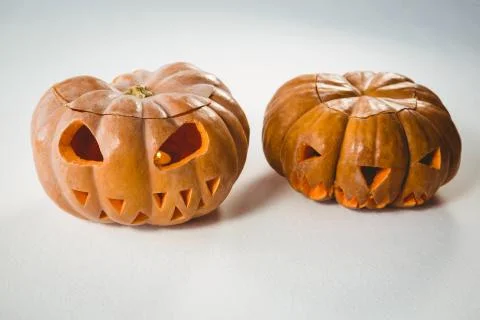 Jack o lanterns over white background Stock Photos