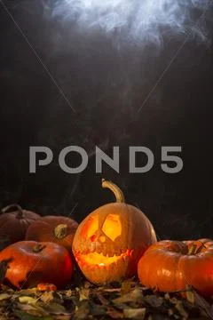 Jack-o-latern in smoke Stock Photos