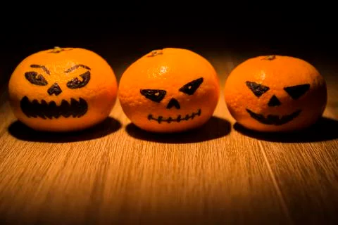 Jack o'lantern tangerines Stock Photos