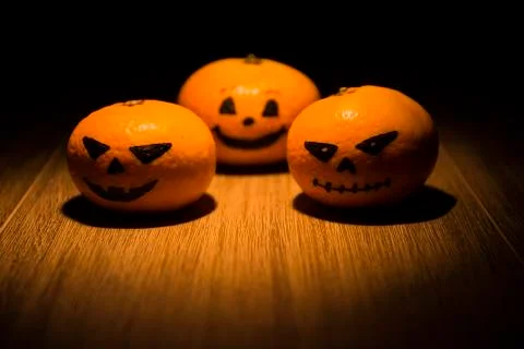 Jack o'lantern tangerines Stock Photos