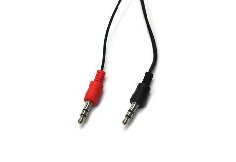 Jack plug and a cable isolated on the white background Stock Photos