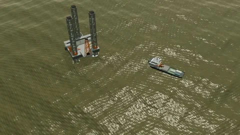 Jack up rig and standby vessel aerial sediment coastal haze offshore field l Vídeos de archivo 343894372