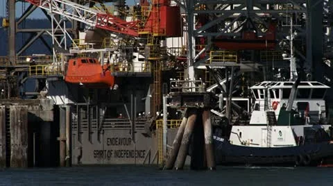 Jack Up Rig Close with Tug at Dock 스톡 동영상 11882100