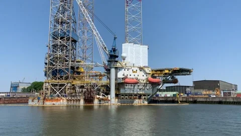 Jack up (self elevating) drilling rig at Port of Rotterdam. Netherlands Stock Footage 254190163