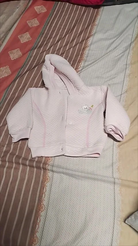 Jacket for baby sister Stock Footage 293055741