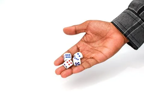 Jacketed hands holding dice Stock Photos