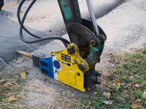 Jackhammer and drilling machine on construction site Stock Photos