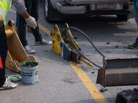 Jackhammer and drilling machine on construction site Stock Photos