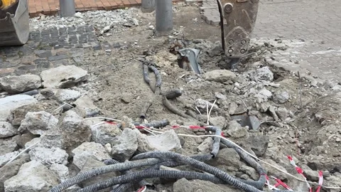 Jackhammer Breaking Concrete Exposing Underground Cables Road Construction Stock Footage 341618833
