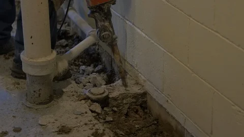Jackhammer Breaking Up Concrete Floor Footage 100694218