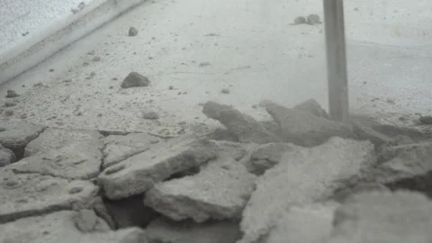 The jackhammer breaks the cement screed. Work with a perforator Stock Footage 244050899