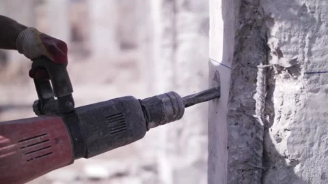 Jackhammer breaks concrete slow motion Stock Footage 192472254