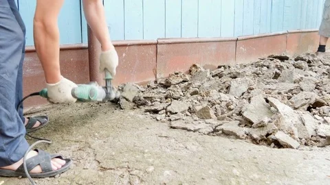 Jackhammer breaks rocks into dust Stock-Footage 80274840