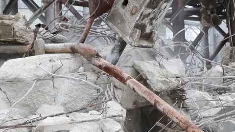 Jackhammer destroying a concrete structure with audio Stock Footage 72778845