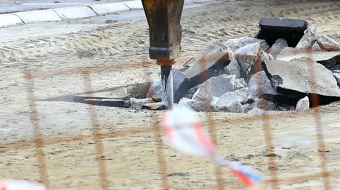 Jackhammer machine digging up concrete road Stock-Footage 45599889
