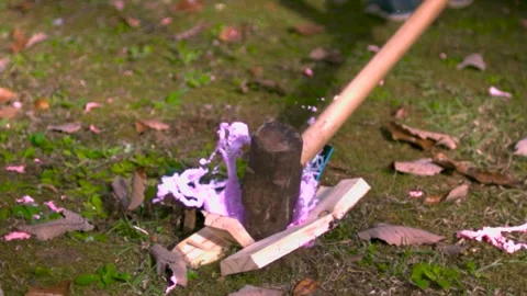 Jackhammer or a large metallic hammerhead with a wooden handle hitting a Stock Footage 284307524