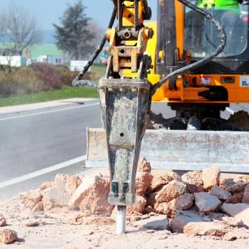Jackhammer working on the road Stock Photos