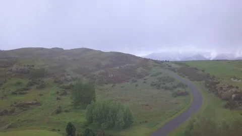 Jacks Point Hiking Track And Golf Course In The Rain - Queenstown - Drone Video stock 248436417