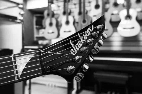 Jackson guitar headstock close up, black and white, selective focus Stock Photos