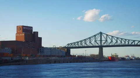 Jacques Cartier Bridge and Molson Brewery in Old Port of Montreal Stock Footage 107739079