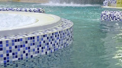 Jacuzzi among swimming pool with SPA Video stock 73120865