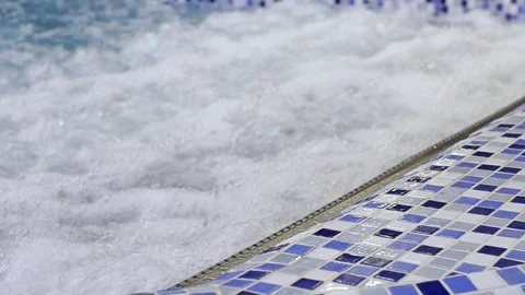 Jacuzzi among swimming pool with SPA Stock Footage 73336082