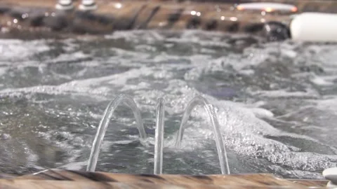 Jacuzzi jet of blue water with bubbles 库存影片 88561016