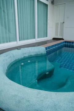 Jacuzzi in the swimming pool Stock Photos