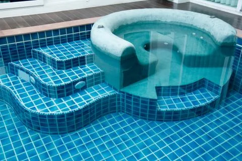 Jacuzzi in the swimming pool Stock Photos