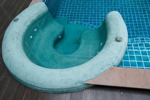 Jacuzzi in the swimming pool Stock Photos