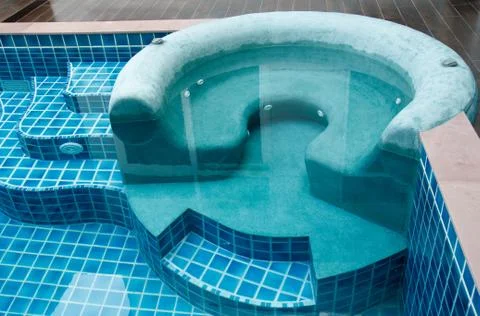 Jacuzzi in the swimming pool Stock Photos