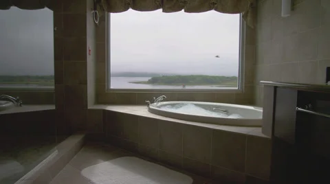Jacuzzi Tub with Bubbles by Window Stock Footage 35290957