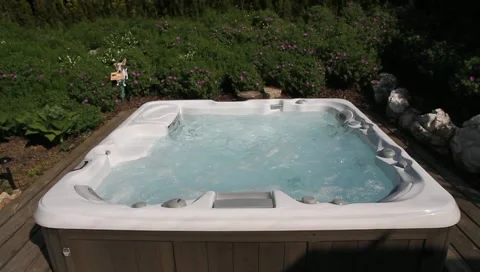 Jacuzzi/Whirlpool in the garden Vídeos de archivo 10692434