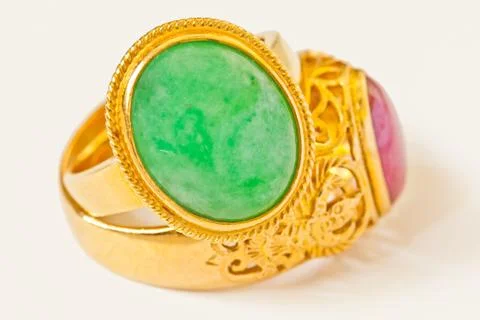 Jade and ruby ring isolated on white 스톡 사진