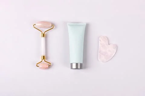Jade roller and gua sha Stock Photos