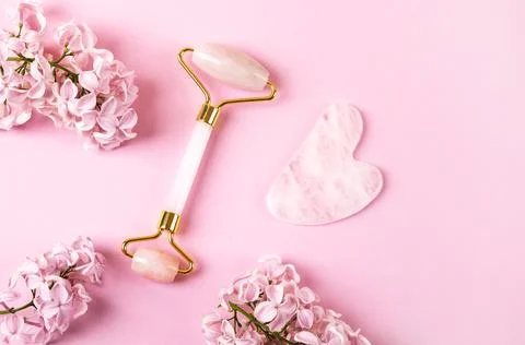 Jade roller and gua sha Stock Photos