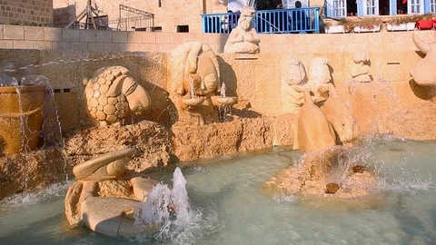 Jaffa, Israel - Dec 16, 2017: Part of Zodiac Fountain in Kedumim square in Jaffa Stock Footage 100367608