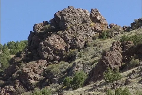 Jagged Lumpy Rock Outcropping on Hillside in Utah Stock Footage 121487913