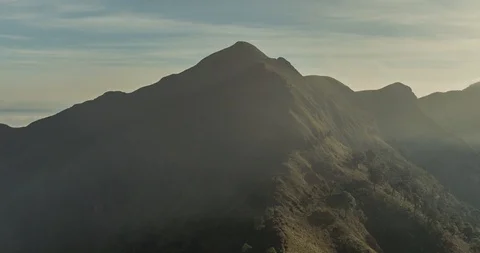 Jagged Mountain Peaks above Cloud Layer (4K Time-lapse) Video stock 107930485